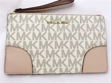 pink michael kors wristlet|michael kors wristlet wallet outlet.